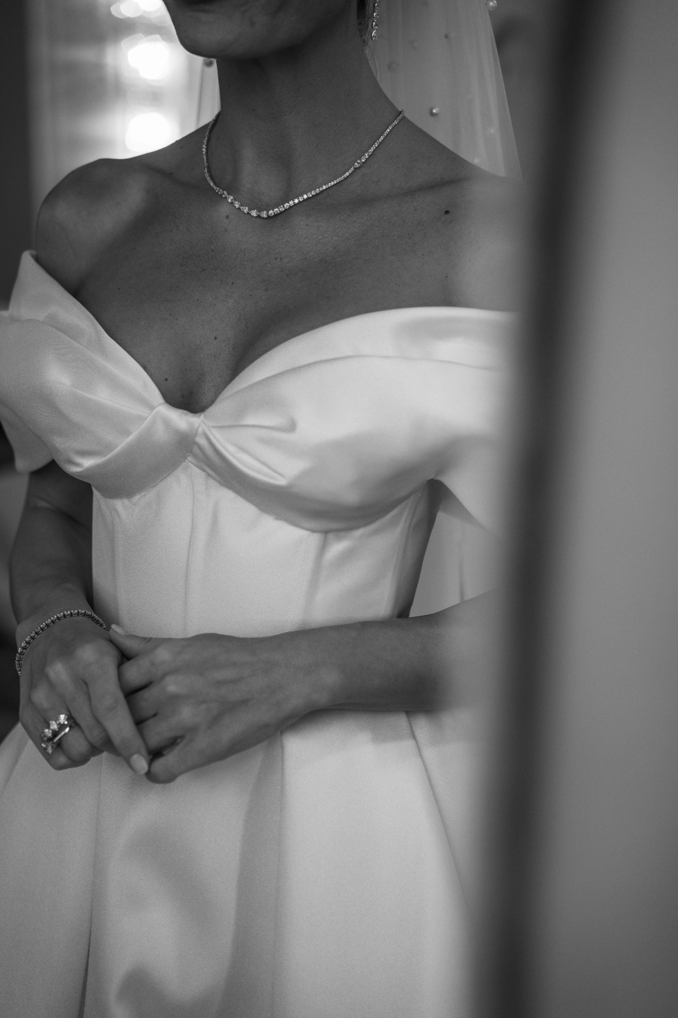 Bride detail portrait with diamond necklace