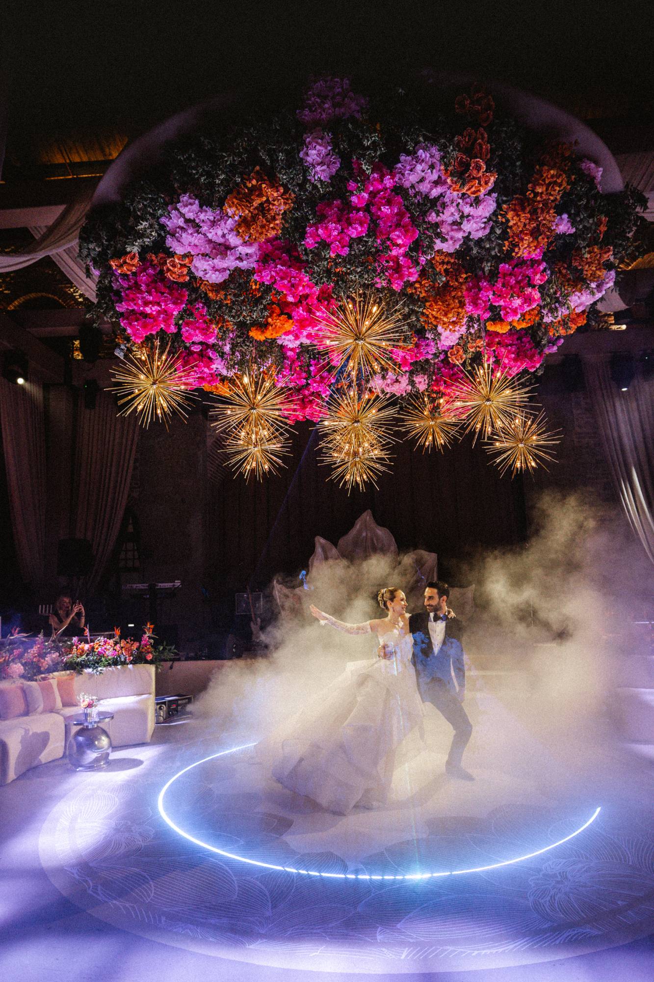 Floral and firework-light first dance installation